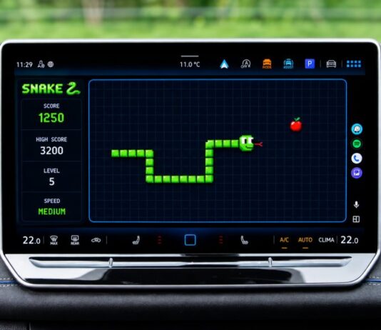 Xtream Player interface on an Android Auto display