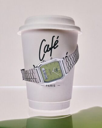 Front view of the Casio AQ-230ECK-3A Caf&eacute; Kitsun&eacute; edition, showing its green analog-digital dial.