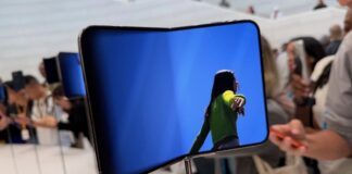 Apple iPhone Duo foldable phone shown opening between its outer and internal displays.