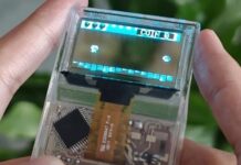 Arduview Puts an OLED Screen and PCB Inside a Fully Transparent 50g Handheld Arduview transparent handheld gaming console showing its see-through chassis and internal layout