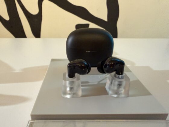 REDMI Buds 8 on a product stand.