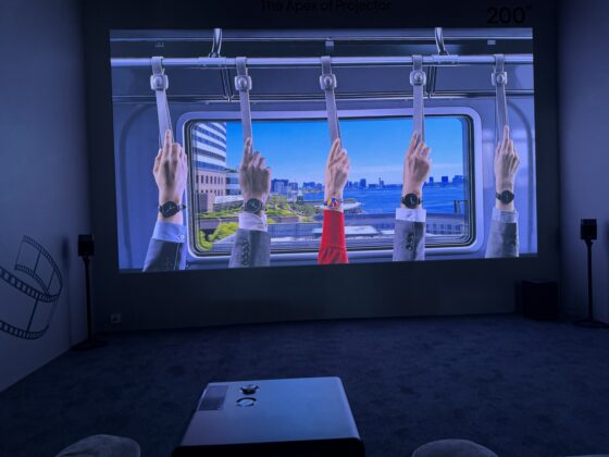 Hisense XR10 projector shown at an event display