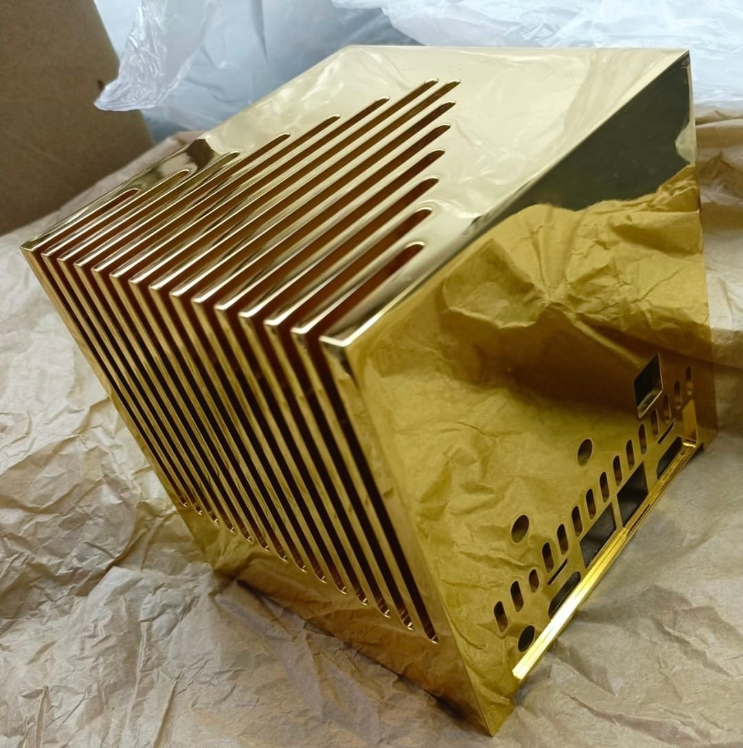Solid 24K gold Kubb Fanless mini PC shown from an angled view