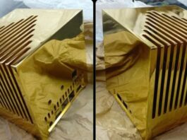 Custom Kubb Fanless mini PC with a solid 24K gold chassis
