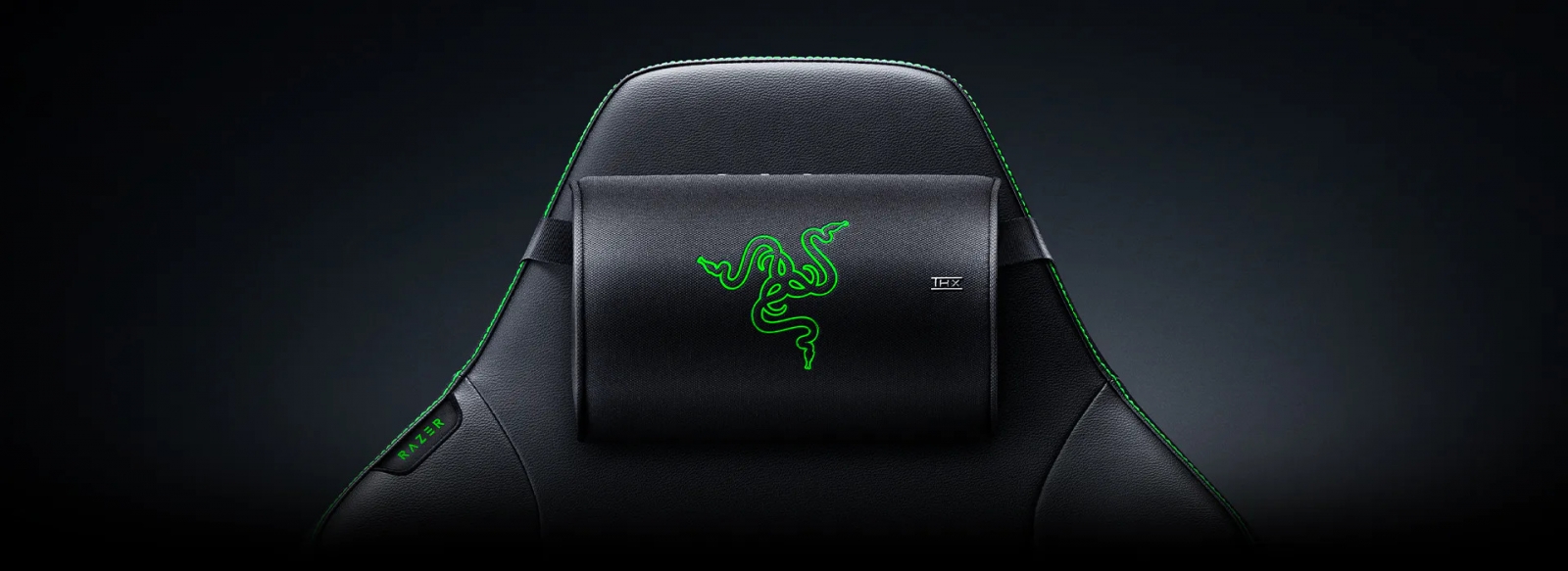 sunet-surround-fara-casti-razer-a-gasit-solutia-si-se-numeste-clio-x-perna-audio-wireless-cu-thx-spa Razer Clio X wireless audio cushion mounted on a high-back gaming chair