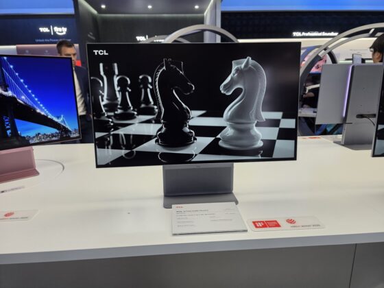 Side view highlighting the slim TCL 32X3A OLED+ chassis