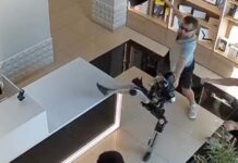 Humanoid robot at a store in Saratov, Russia, where footage showed it making kicking motions after being pushed.
