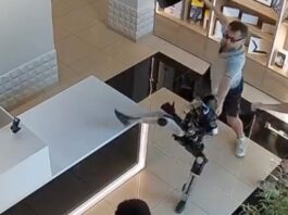 Humanoid robot at a store in Saratov, Russia, where footage showed it making kicking motions after being pushed.