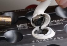Apple AirPods 5 earbuds shown during a repairability teardown.