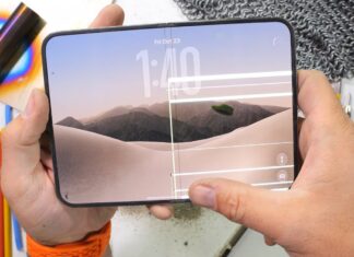 iPhone Duo Hinge Seizes in JerryRigEverything Dust Test, Inner Display Fails Under Bending Apple iPhone Duo foldable phone shown in a durability-testing context