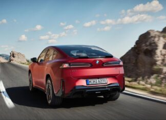BMW iX4 Revealed With Up to 828 km WLTP Range and 400 kW Charging BMW iX4 electric SUV coupe