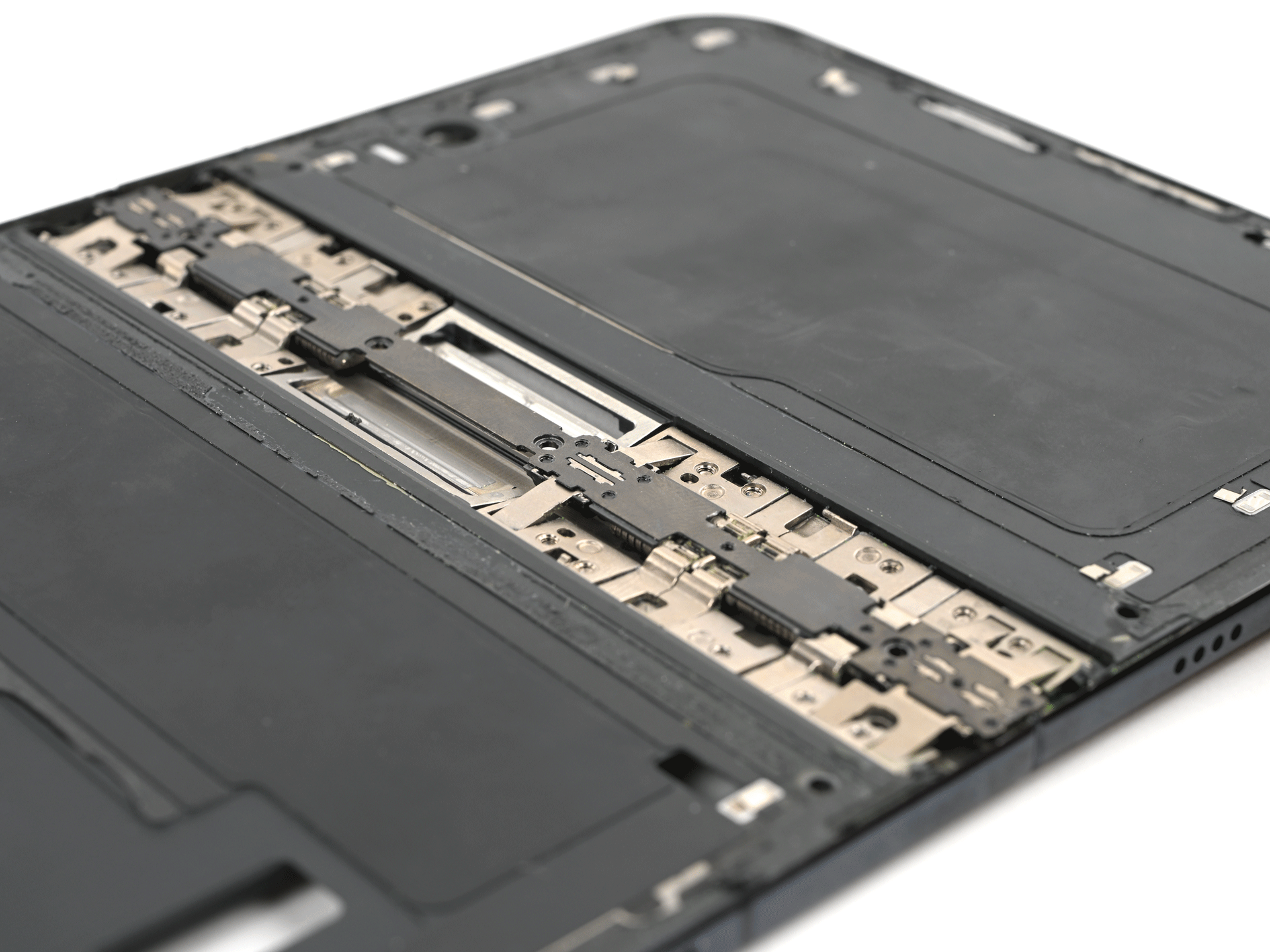 iPhone Duo hinge structure examined by iFixit for a possible central support pressure point