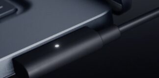 Microsoft Surface Laptop Ultra shown with its Magnetic Connect cable attached.